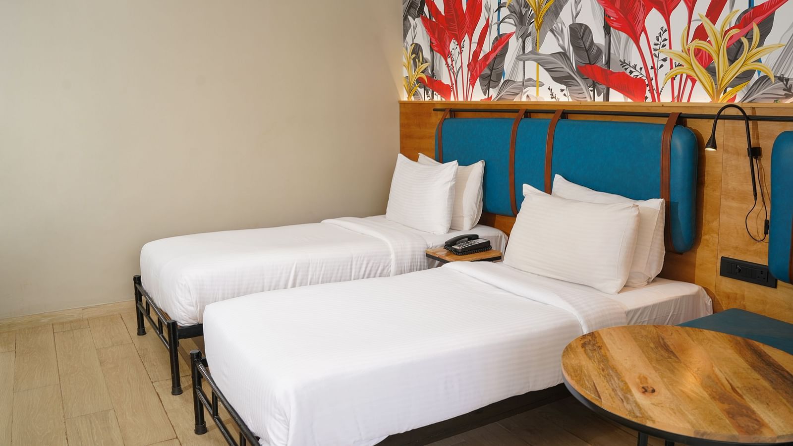 Twin beds in Cozy Twin Room at Indie Stays Resort, Goa.